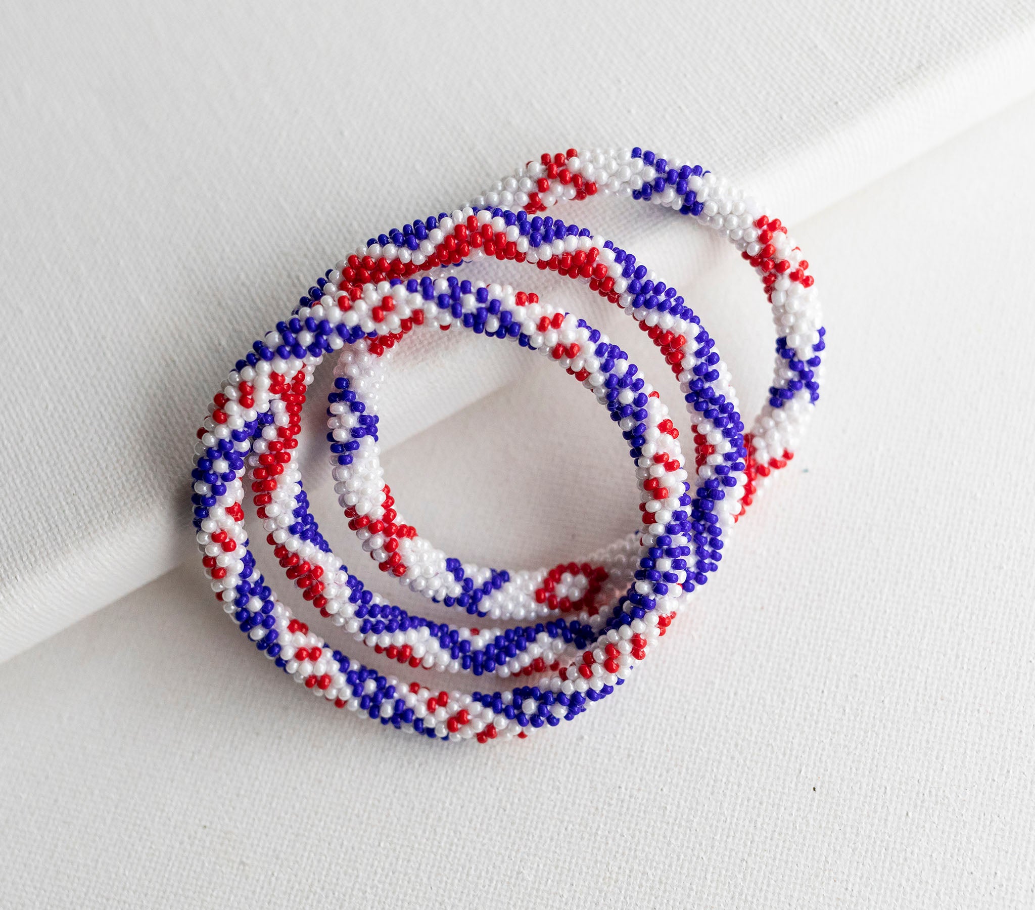 Roll-On® Bracelets Americana – Aid Through Trade Roll-On® Bracelets Americana – Aid Through Trade