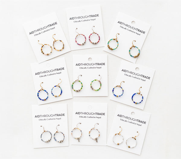 **NEW** <br> Mini Hoop Earring <br> Mystery